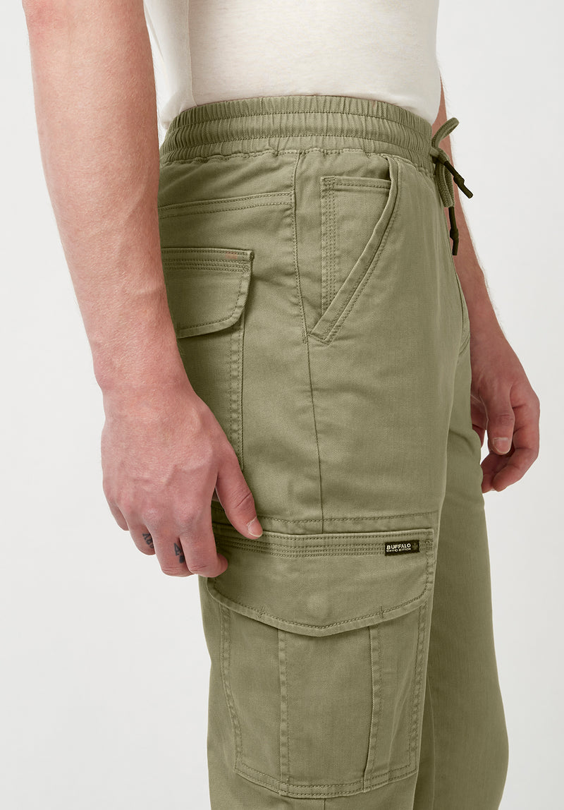 Buy Men Beige Mid Rise Cargo Pants Online In India